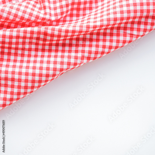 crumple pink plaid fabric or classic tablecloth on white background with copy space