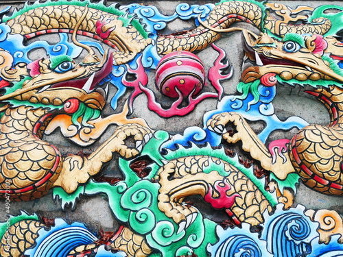 Carving and sculpture dragon design chinese style on wall of Tiantan temple for chinese people traveler people travel visit and respect pray at Shantou town or Swatow city in Guangdong Chaozhou, China
