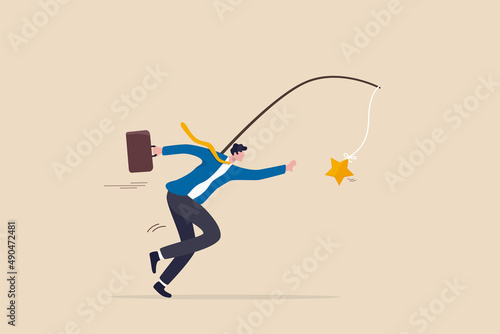 Motivation to success, incentive or reward to motivate employee, chasing for reward or work success, aspiration concept, ambitious businessman running with carrot stick trying to grab star prize award