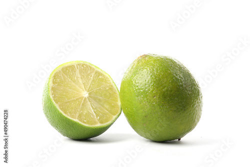 A close-up of limes isolated on white
