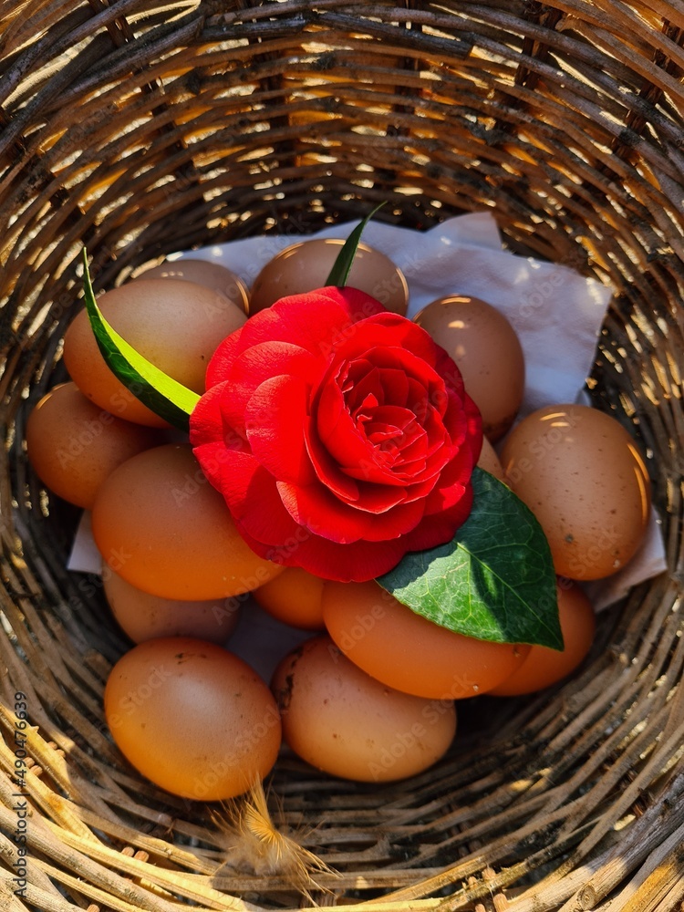 basket with roses and eggs