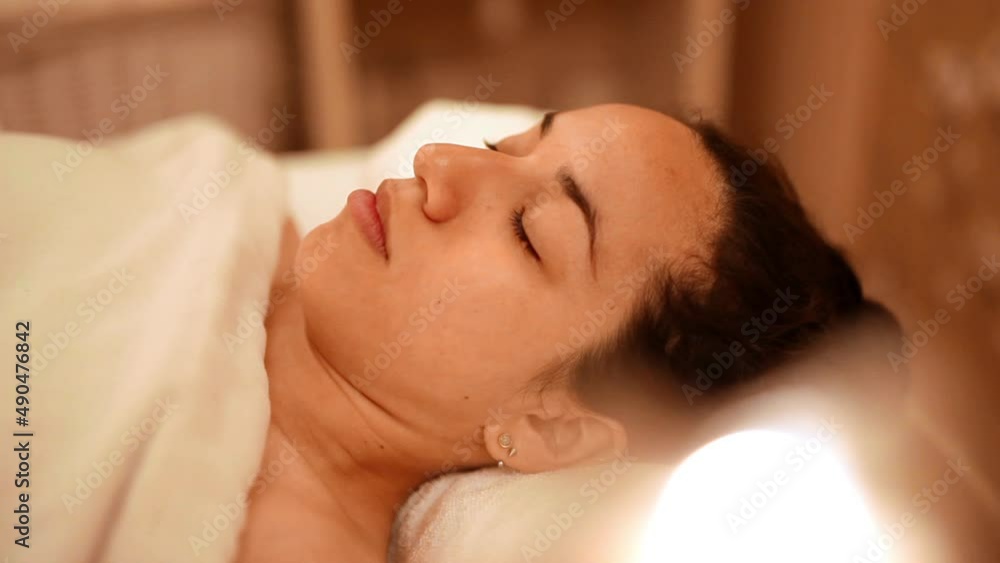 Deep sleeping at soothing luxury spa with candles around Deep sleeping at soothing luxury spa with candles around