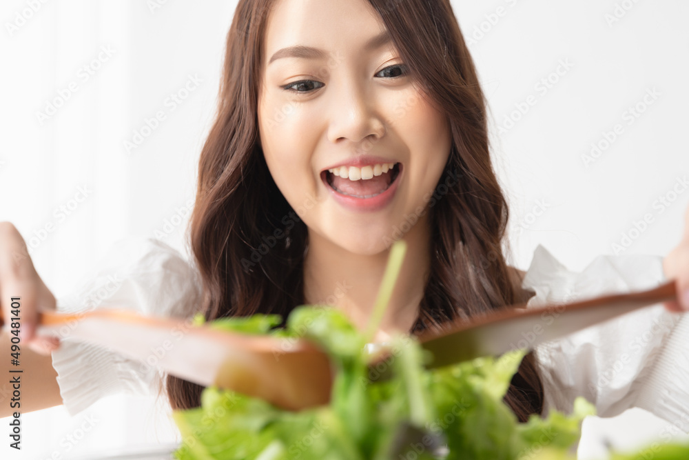 Healthy lifestyle, Close up beautiful young asian woman cooking salad smiling happy. Healthy eating, Food and lifestyle, Health, Beauty, Dieting concept.