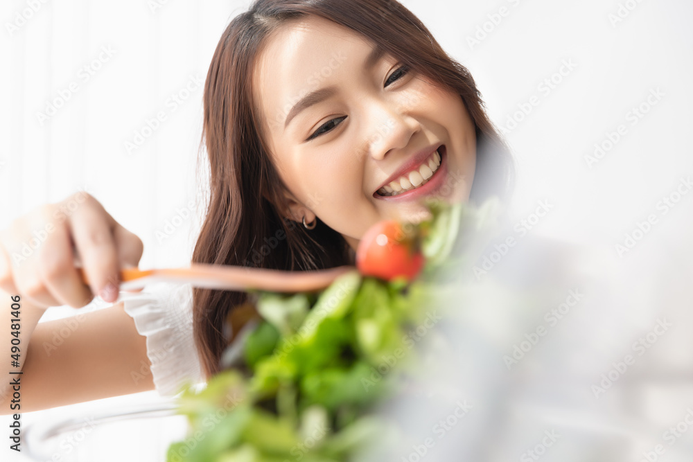 Healthy lifestyle, Close up beautiful young asian woman cooking salad smiling happy. Healthy eating, Food and lifestyle, Health, Beauty, Dieting concept. Healthy lifestyle, Close up beautiful young asian woman cooking salad smiling happy. Healthy eating, Food and lifestyle, Health, Beauty, Dieting concept.