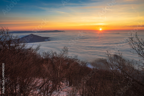 Sunrise on the highest mountain of the Czech Central Highlands Milesovka. Its peak lies at an altitude of 836.7 meters above sea level
