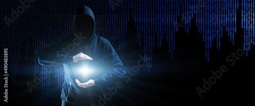 Cyber security hacker concept. Internet web hack technology. Blurred Hacker man hand isolated on black with flare ray flash effect. Data protection, secured internet access, cybersecurity.