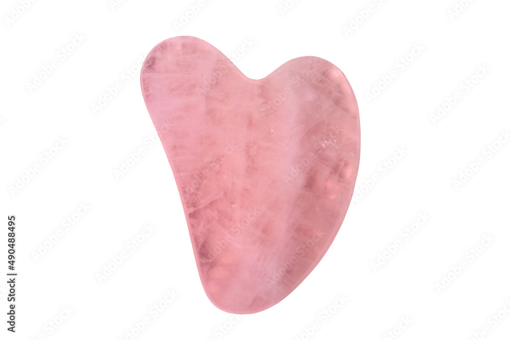 Natural Gua Sha Rose quartz Stone isolated. Guasha Massage Tool alternative therapy to improve circulation. Face stone massage.  Clipping path. Chinese healing method to better health.