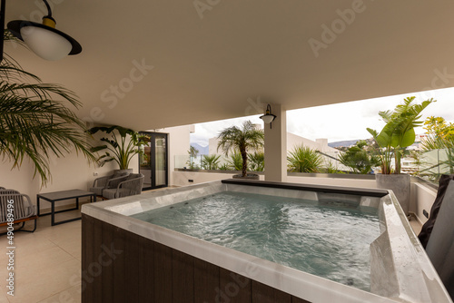 Hydromassage bathtub on the hotel terrace © rilueda