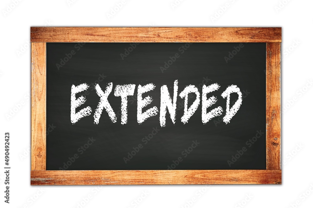 Fototapeta premium EXTENDED text written on wooden frame school blackboard.