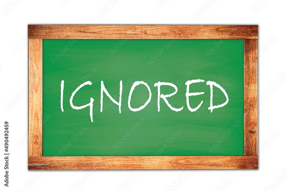 IGNORED text written on green school board. IGNORED text written on green school board.