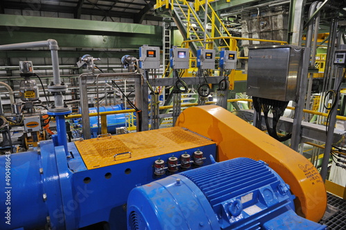 Pavlodar region, Kazakhstan - 12.10.2015 : Generators and pipes at a sulfide ore and copper processing plant