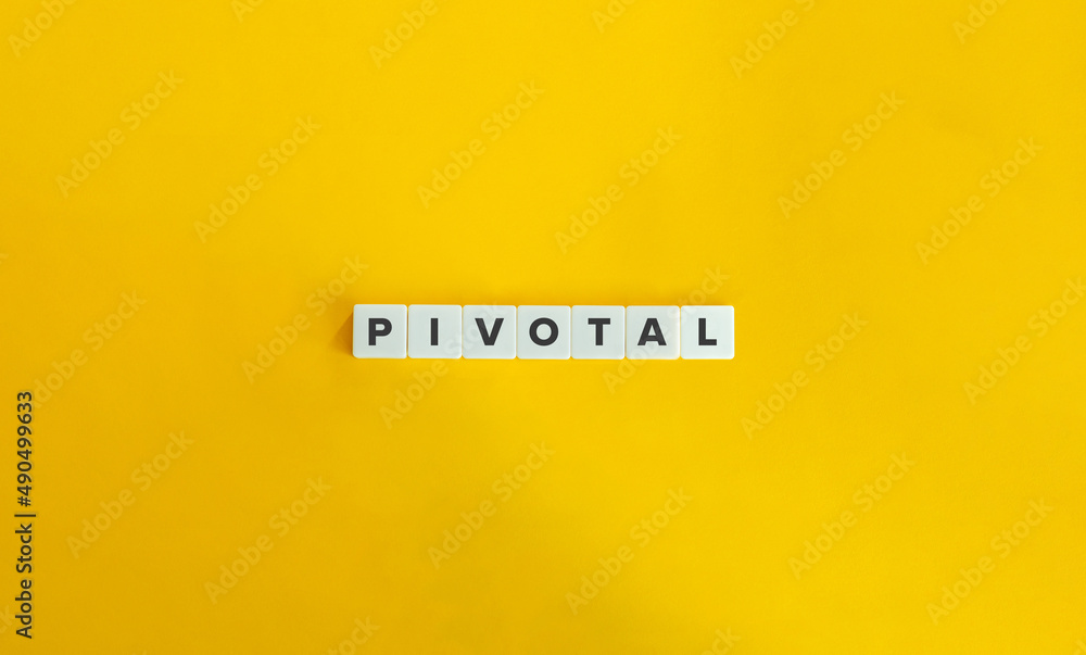 Pivotal Word on Letter Tiles on Yellow Background. Minimal Aesthetics. Pivotal Word on Letter Tiles on Yellow Background. Minimal Aesthetics.