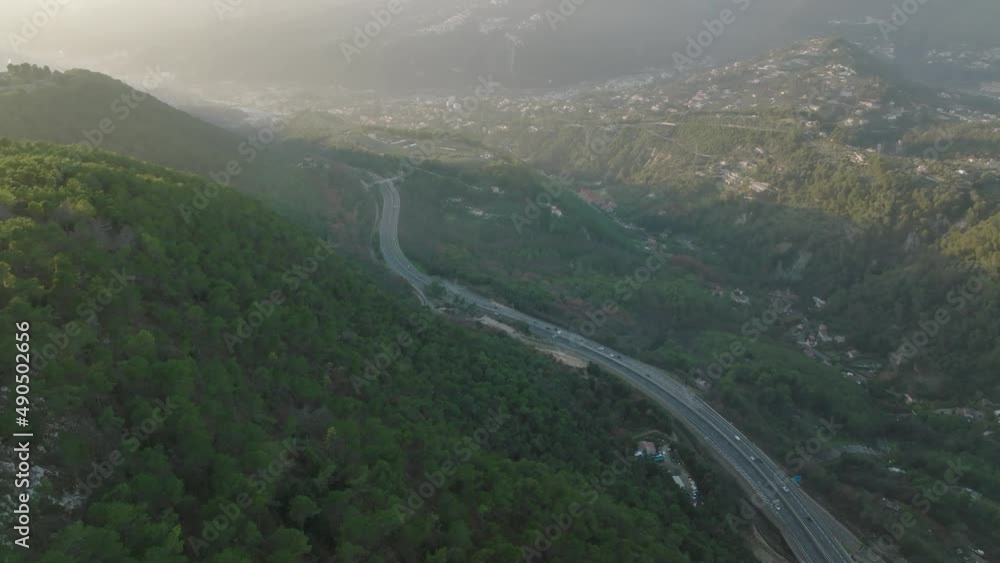 Aerial drone flight over Côte d’Azur near Nice Nizza during warm sunset light Aerial drone flight over Côte d’Azur near Nice Nizza during warm sunset light