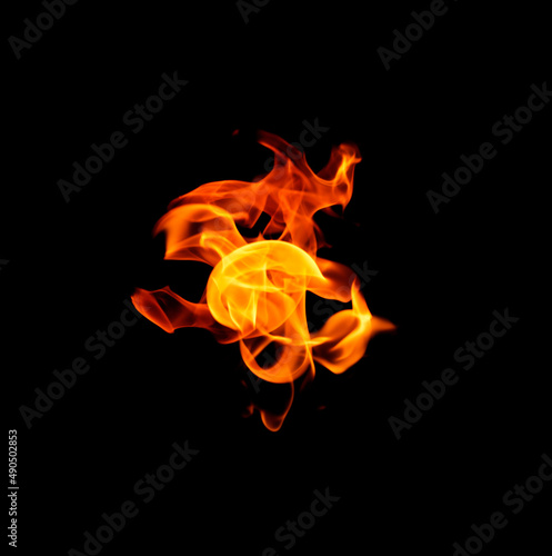 Fire flame isolated on a black background.