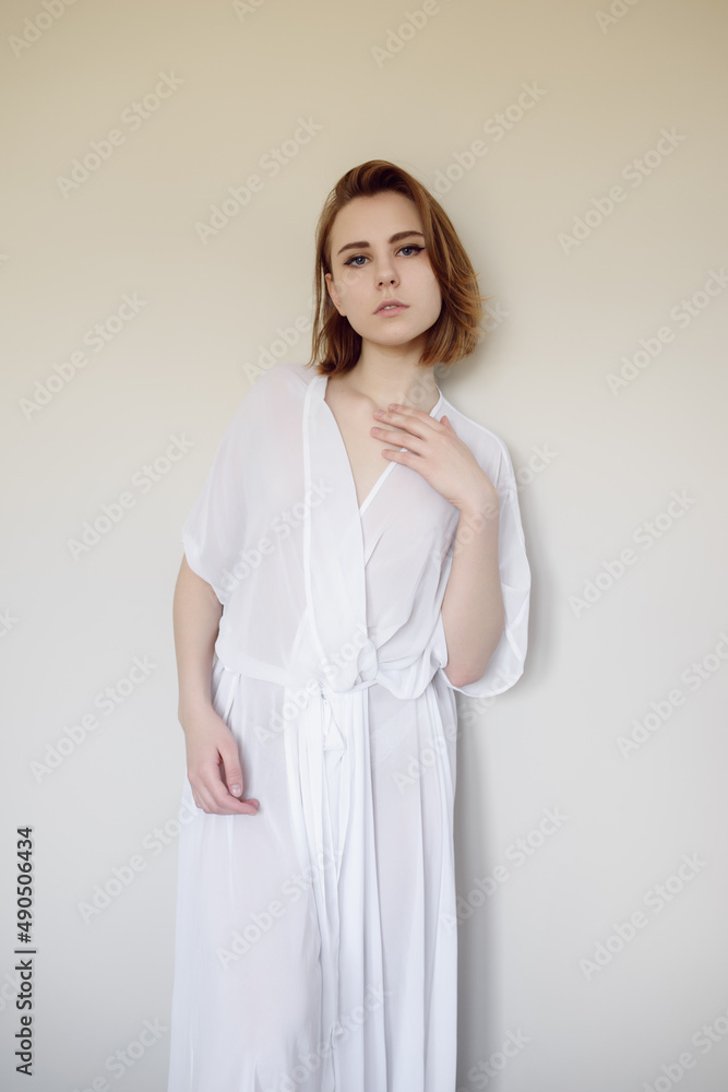 Portrait of a beautiful young woman with blue eyes. Portrait of a beautiful young woman with blue eyes.