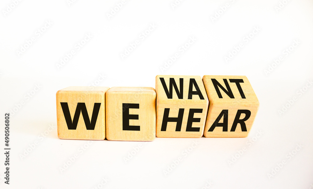 We want and hear you symbol. Turned wooden cubes and changed concept words We hear to We want. Beautiful white table white background. Business we want and hear you concept. Copy space. We want and hear you symbol. Turned wooden cubes and changed concept words We hear to We want. Beautiful white table white background. Business we want and hear you concept. Copy space.