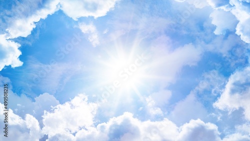 Magic fairy-tale sky and clouds with a shining sun. © Довидович Михаил