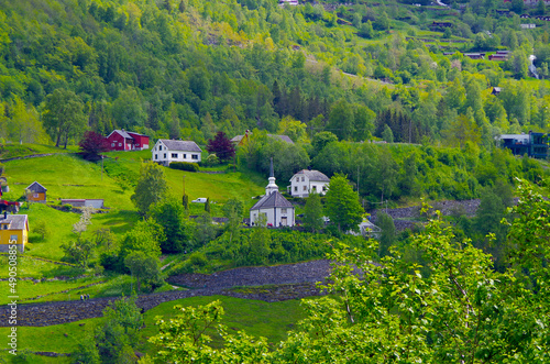 Breathtaking scenery of mountains, galciers and waterfalls in Geirangerfjord during cruising to Norway in Geiranger with beautiful scenic panorama nature landscape in Fjord photo