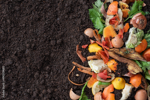 Organic waste and black soil with a copy space
