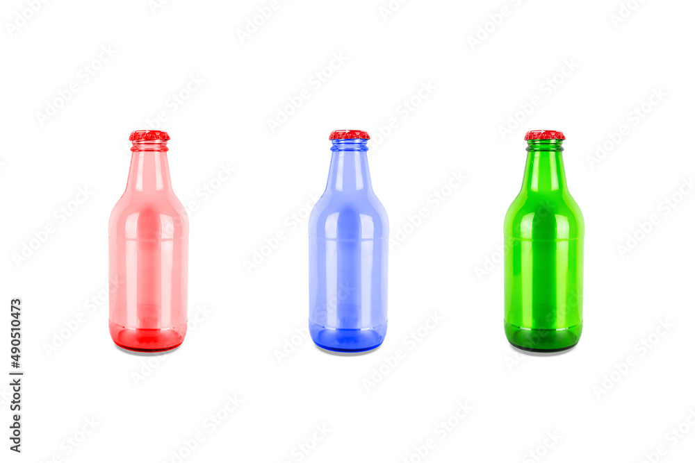 Three empty glass bottles with caps, red, blue and green, isolated on white background Three empty glass bottles with caps, red, blue and green, isolated on white background