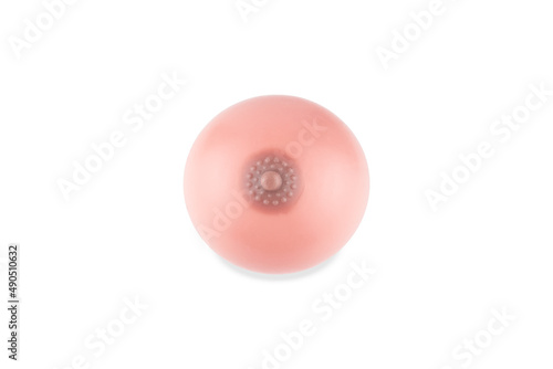 Rubber female breast with nipple with silicone inside, toy, isolated on white background