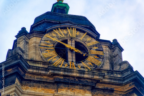 Photography Old church clock tower in Brussels, Belgium.