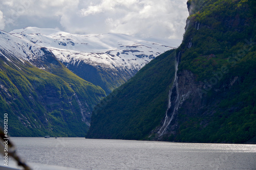 Breathtaking scenery of mountains, galciers and waterfalls in Geirangerfjord during cruising to Norway in Geiranger with beautiful scenic panorama nature landscape in Fjord photo