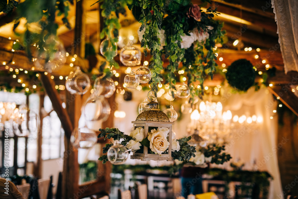 Table setting at a luxury wedding and beautiful flowers on the table. Table setting at a luxury wedding and beautiful flowers on the table.