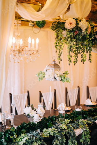 Table setting at a luxury wedding and beautiful flowers on the table.