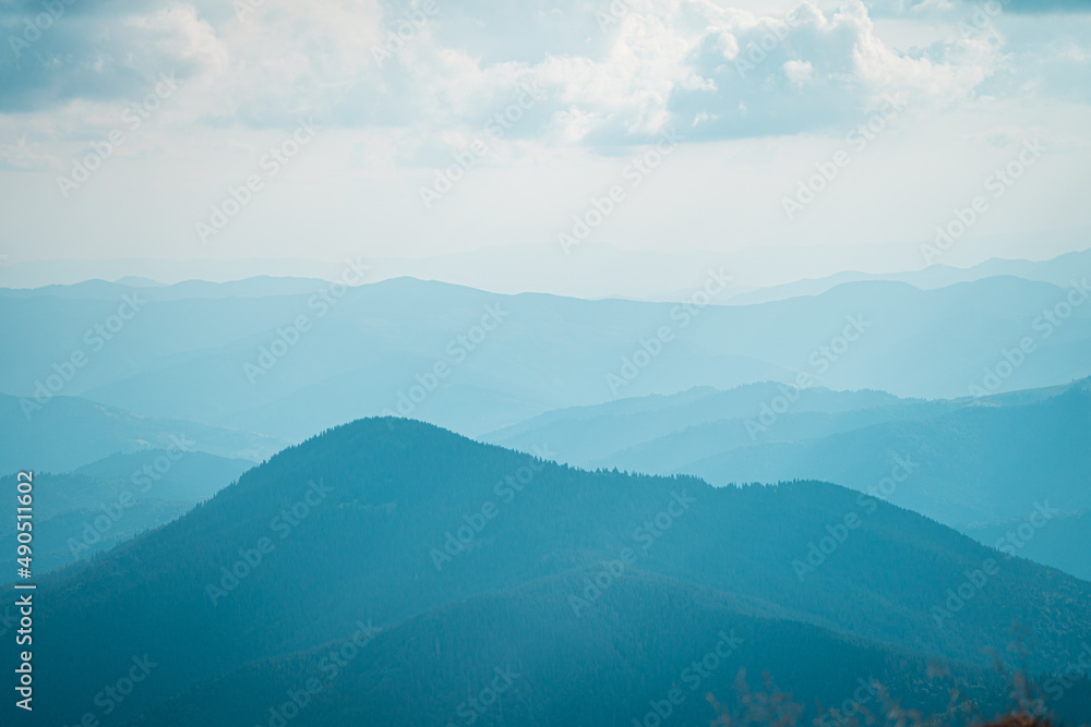 Fototapeta premium Peaks of blue mountains