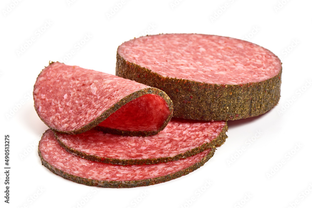 Peppered salami slices, isolated on white background. Peppered salami slices, isolated on white background.