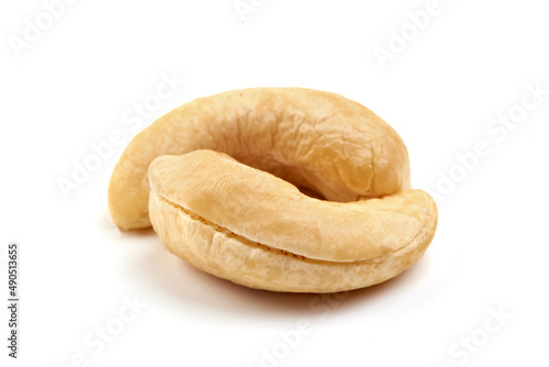 Organic Cashew nuts, close-up, isolated on white background.