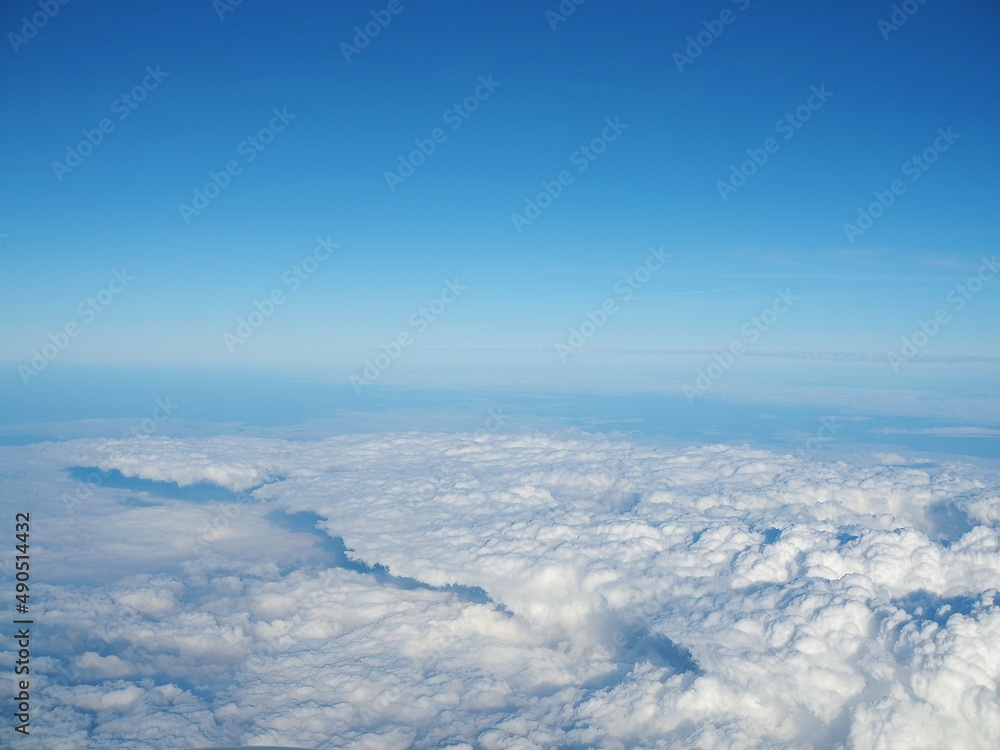 Naklejka premium clouds over the sea