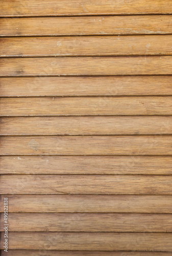 Texture of a wooden rolling door closeup.