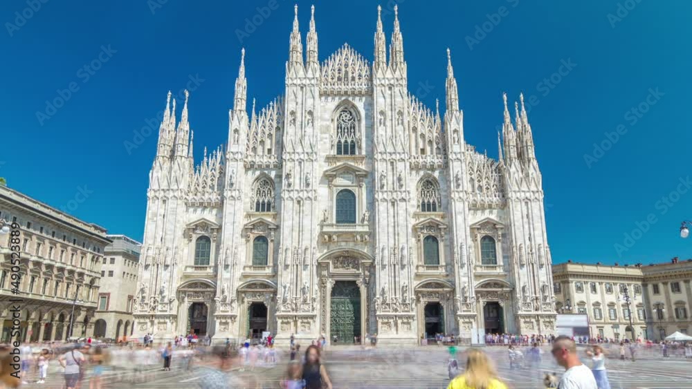 The Duomo cathedral timelapse hyperlapse. Front view with people walking on square The Duomo cathedral timelapse hyperlapse. Front view with people walking on square