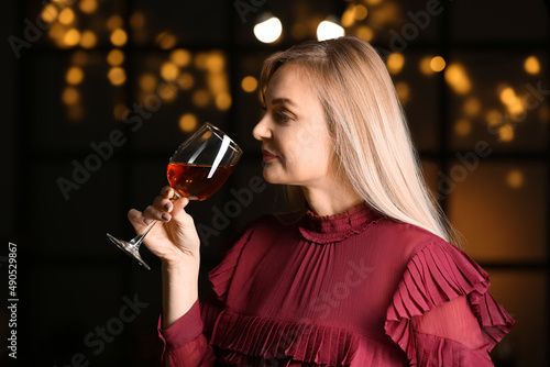 Female sommelier tasting types of wine