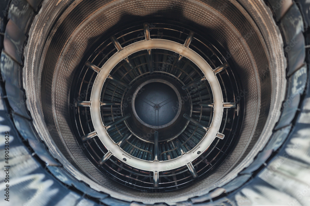 Close up, F16 air force plane jet engine aerospace manufacturing.
