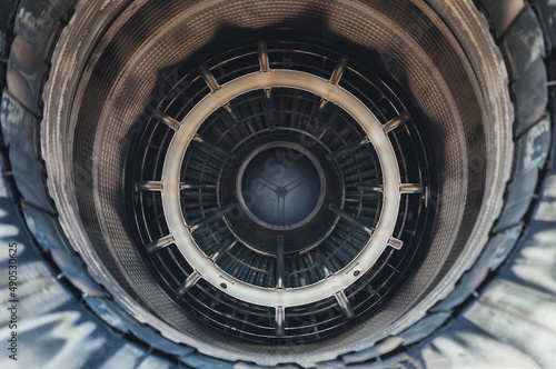 Close up, F16 air force plane jet engine aerospace manufacturing. photo