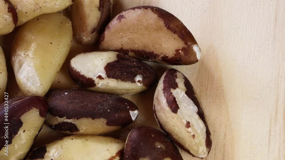 Closeup of Brazil nuts rotating. Closeup of Brazil nuts rotating.