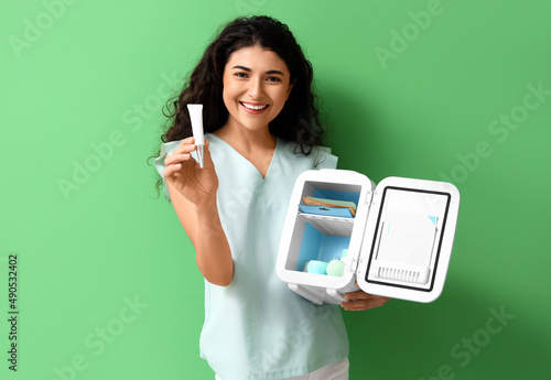 Beautiful smiling woman hol...