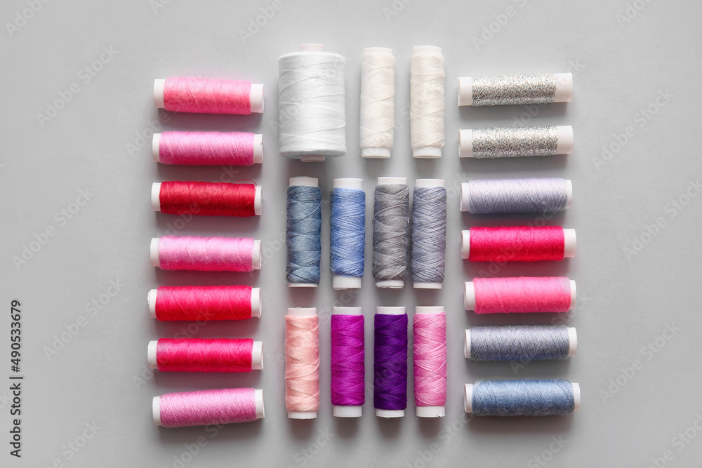 Thread spools on light background Thread spools on light background