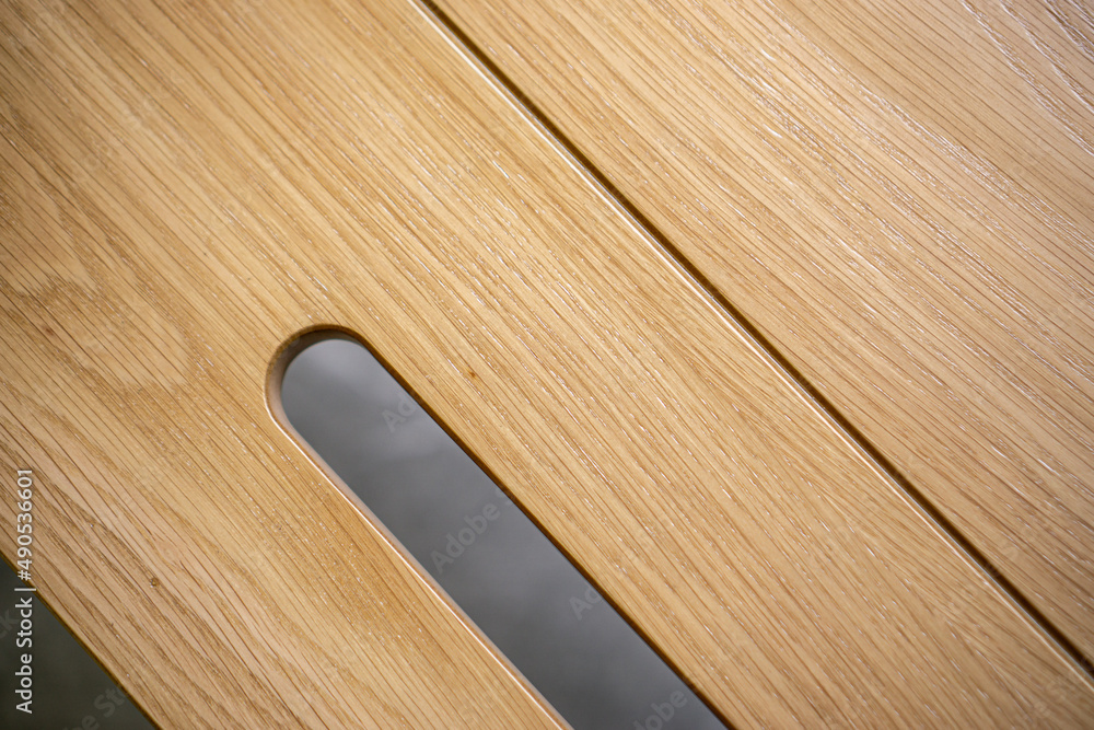 Empty rough wooden table top in the dark room