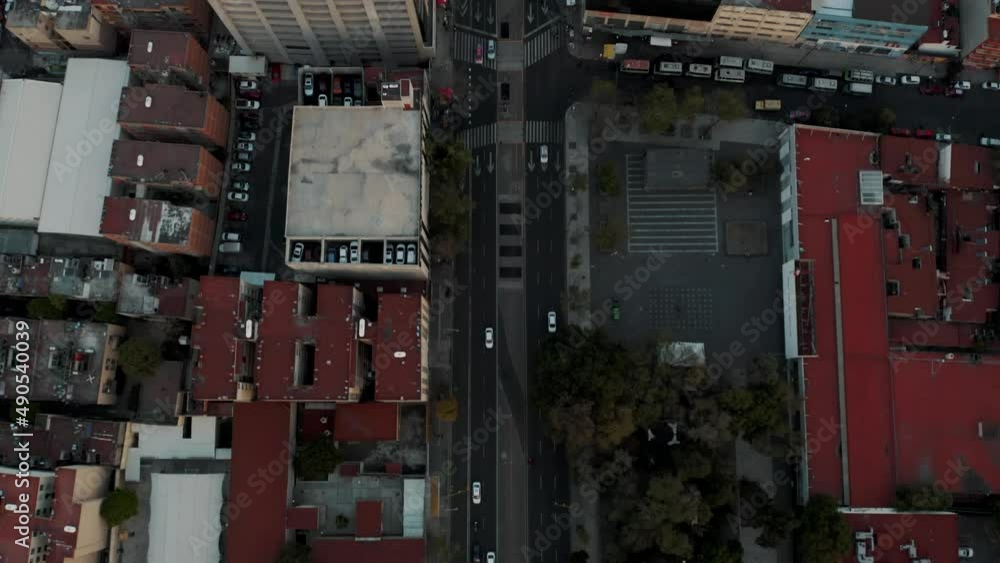 Bird's Eye View Of Street In Mexico City On A Cloudy Day - aerial drone shot Bird's Eye View Of Street In Mexico City On A Cloudy Day - aerial drone shot