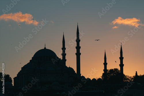 Laylat al-Qadr background. Silhouette of Suleymaniye Mosque at sunset