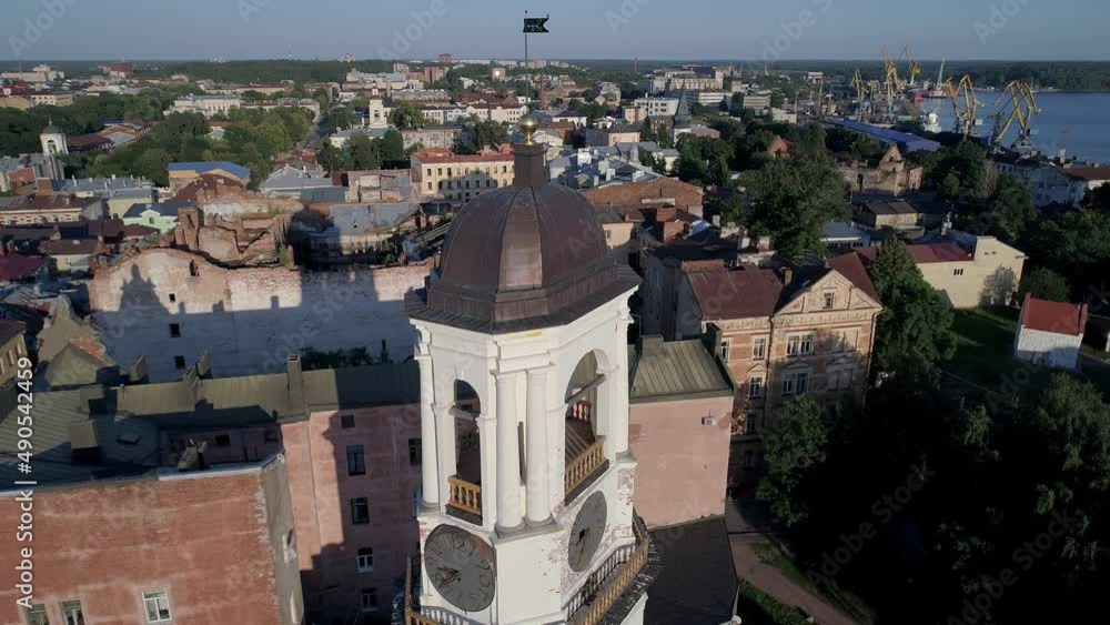 Aerial view of a medieval clock tower in heart of Vyborg old town. Panoramic cityscape Aerial view of a medieval clock tower in heart of Vyborg old town. Panoramic cityscape