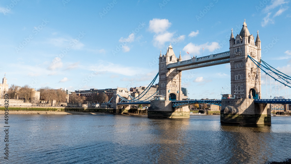 London Tower Bridge. A view from the south bank of the famous landmark crossing the River Thames on a cold but sunny winters day.