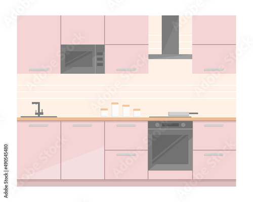 Set of kitchen furniture in modern style. Built-in microwave and wall cabinets, built-in black oven and electric hob, sink with faucet. Kitchen unit