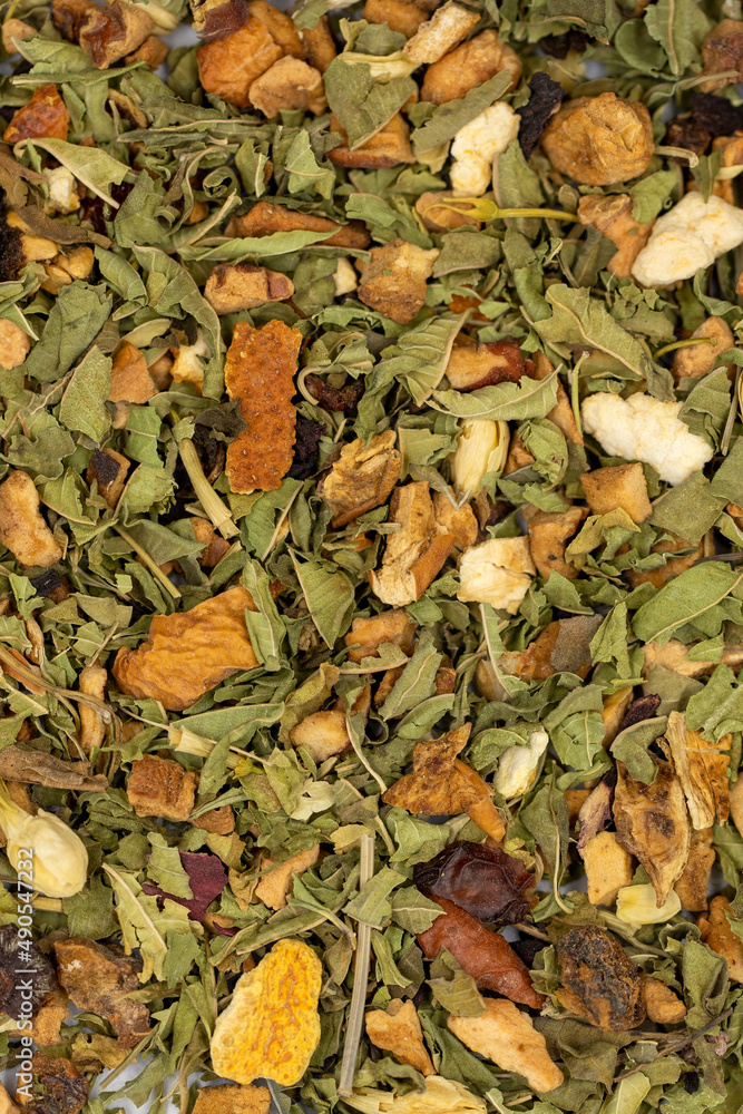 Relax herbal tea. Herbal tea prepared with lemon balm leaves, jasmine flower, apple peel, orange, lemon and hibiscus particles.