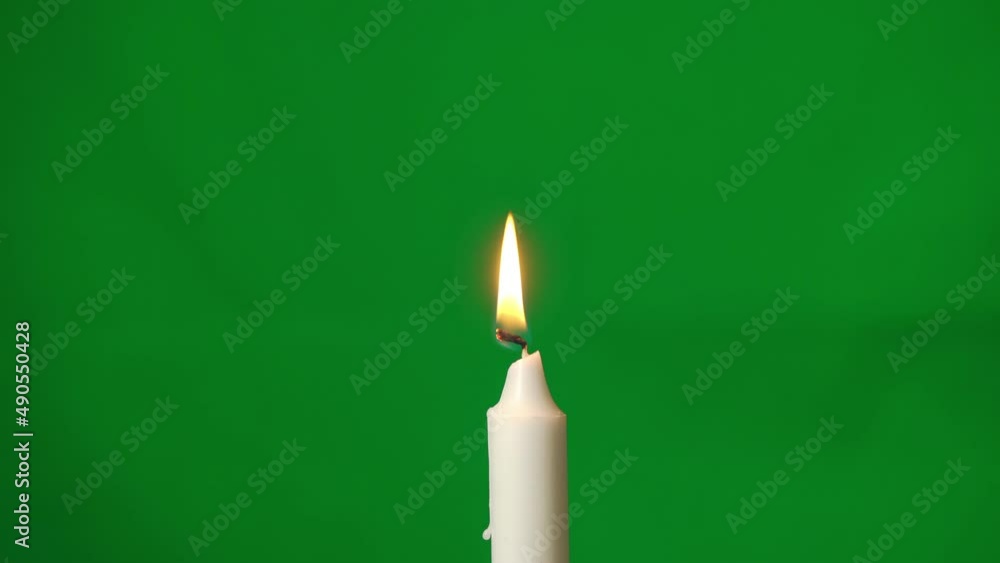 White candle fire flame. Holiday party, religious. Light a candle, then blow out White candle fire flame. Holiday party, religious. Light a candle, then blow out