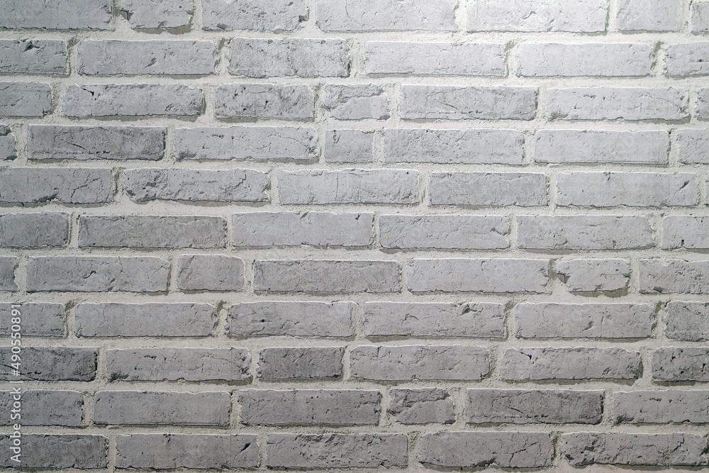 White brick wall texture background made by pattern paper. Wall texture background flooring rock stone old pattern clean concrete grid uneven bricks design stack. Background for the wall in LOFT style White brick wall texture background made by pattern paper. Wall texture background flooring rock stone old pattern clean concrete grid uneven bricks design stack. Background for the wall in LOFT style